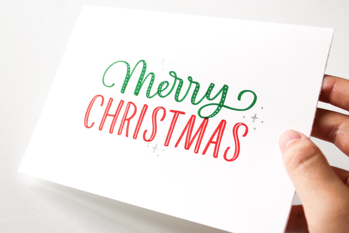 Red and green Merry Christmas lettering card