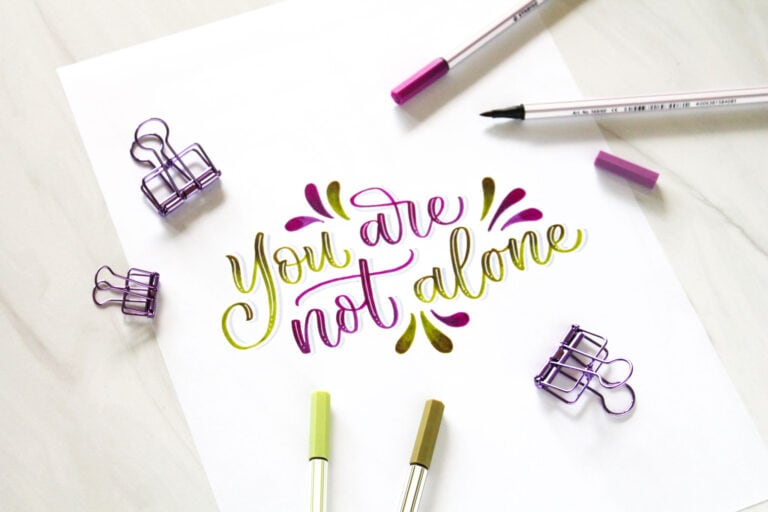 "you are not alone" brush lettering